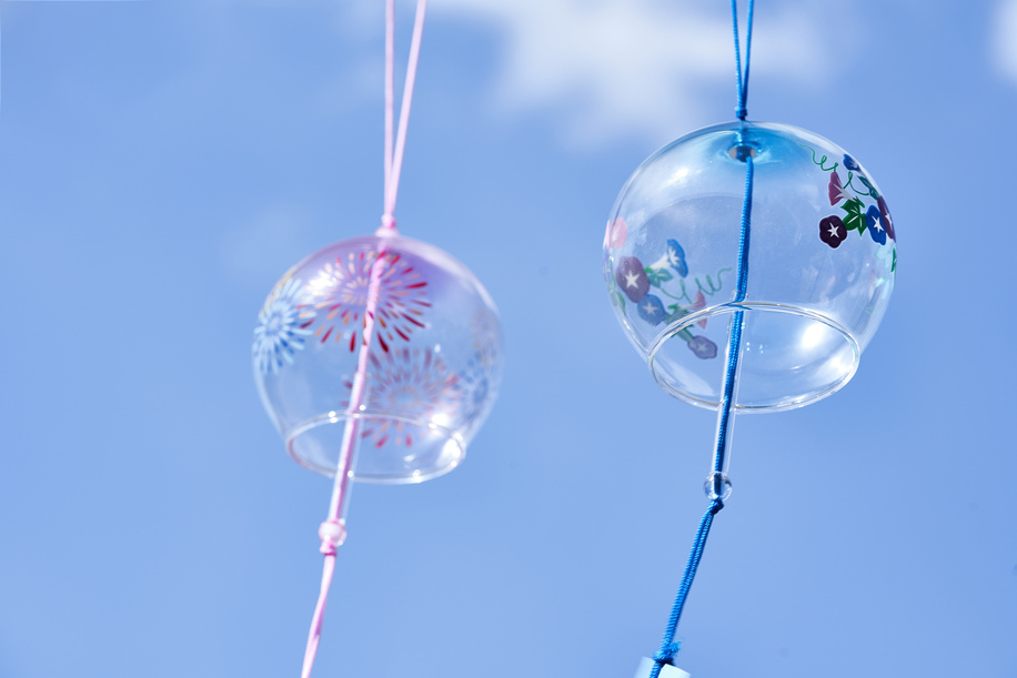 Wind Chimes on Blue Sky Background